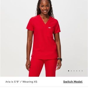 FIGS pop red scrubs. Size Medium for top and bottoms.